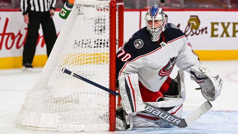 Jan 30, 2022; Montreal, Quebec, CAN; Columbus Blue Jackets goalie Joonas Korpisalo (70) during the second period at Bell Centre. Mandatory Credit: David Kirouac-USA TODAY Sports