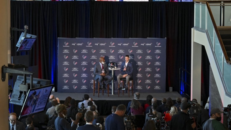 Houston Texans head coach Lovie Smith (left) and general manager Nick Caserio (right) speak during the introductory press conference at NRG Stadium. Mandatory Credit: Maria Lysaker-USA TODAY Sports
