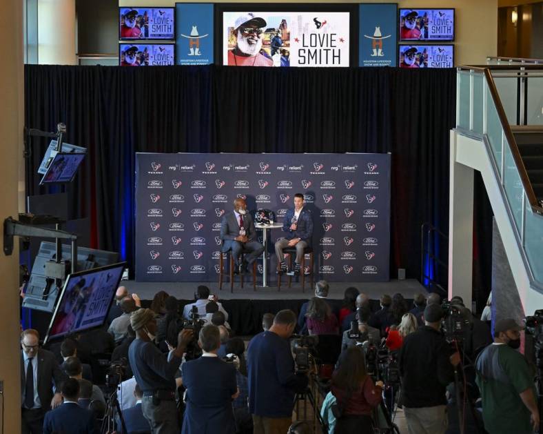 Houston Texans head coach Lovie Smith (left) and general manager Nick Caserio (right) speak during the introductory press conference at NRG Stadium. Mandatory Credit: Maria Lysaker-USA TODAY Sports