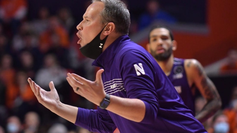 Feb 13, 2022; Champaign, Illinois, USA;  Northwestern Wildcats head coach Chris Collins reacts from the bench during the first half against the Illinois Fighting Illini at State Farm Center. Mandatory Credit: Ron Johnson-USA TODAY Sports