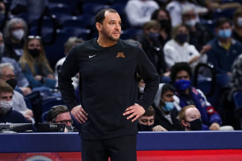 Feb 17, 2022; University Park, Pennsylvania, USA; Minnesota Golden Gophers head coach Ben Johnson looks on from the bench during the first half against the Penn State Nittany Lions at Bryce Jordan Center. Penn State defeated Minnesota 67-46. Mandatory Credit: Matthew OHaren-USA TODAY Sports