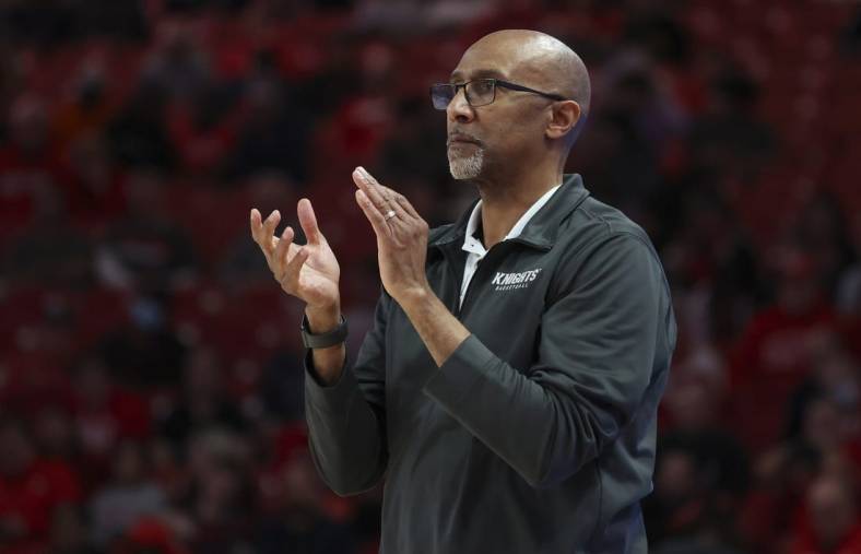 Feb 12, 2022; Houston, Texas, USA; UCF Knights head coach Johnny Dawkins watches play against the Houston Cougars in the second half at Fertitta Center.  Mandatory Credit: Thomas Shea-USA TODAY Sports