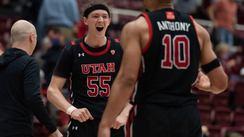 Feb 17, 2022; Stanford, California, USA; Utah Utes guard Gabe Madsen (55) reacts after defeating the Stanford Cardinal at Maples Pavilion. Mandatory Credit: Stan Szeto-USA TODAY Sports