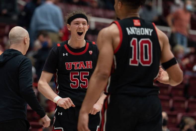Feb 17, 2022; Stanford, California, USA; Utah Utes guard Gabe Madsen (55) reacts after defeating the Stanford Cardinal at Maples Pavilion. Mandatory Credit: Stan Szeto-USA TODAY Sports