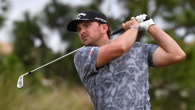 Will Gordon of Davidson, NC, hits from the tee of the par 3, 253-yard, third hole on Friday, Feb. 18, 2022 during the second round of the LECOM Suncoast Classic  on the Korn Ferry Tour at Lakewood National Golf Club.

Lecom Round 2 026