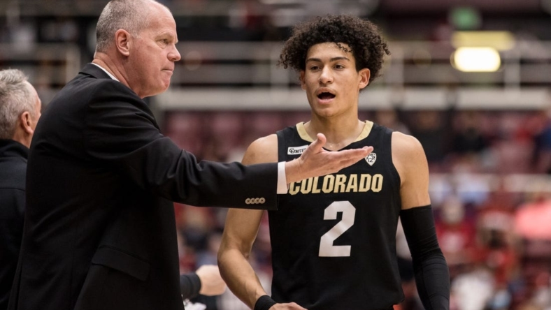 Feb 19, 2022; Stanford, California, USA; Colorado Buffaloes guard KJ Simpson (2) talks to head coach Tad Boyle during the second half against the Stanford Cardinal at Maples Pavilion. Mandatory Credit: John Hefti-USA TODAY Sports