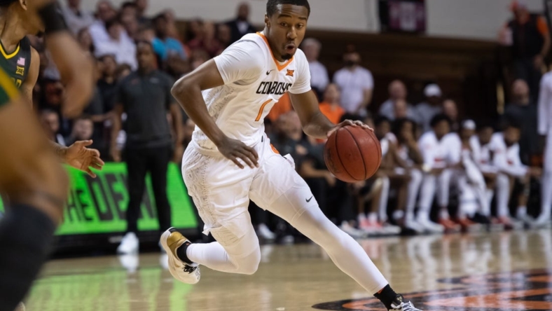 Feb 21, 2022; Stillwater, Oklahoma, USA; Oklahoma State Cowboys guard Bryce Thompson (1) dribbles against the Baylor Bears during the first half at Gallagher-Iba Arena. Mandatory Credit: Rob Ferguson-USA TODAY Sports