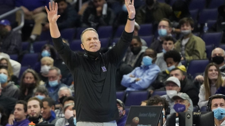 Feb 22, 2022; Evanston, Illinois, USA; Northwestern Wildcats head coach Chris Collins gestures to his team during the second half at Welsh-Ryan Arena. Mandatory Credit: David Banks-USA TODAY Sports