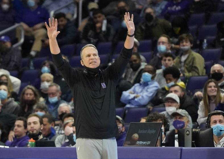 Feb 22, 2022; Evanston, Illinois, USA; Northwestern Wildcats head coach Chris Collins gestures to his team during the second half at Welsh-Ryan Arena. Mandatory Credit: David Banks-USA TODAY Sports