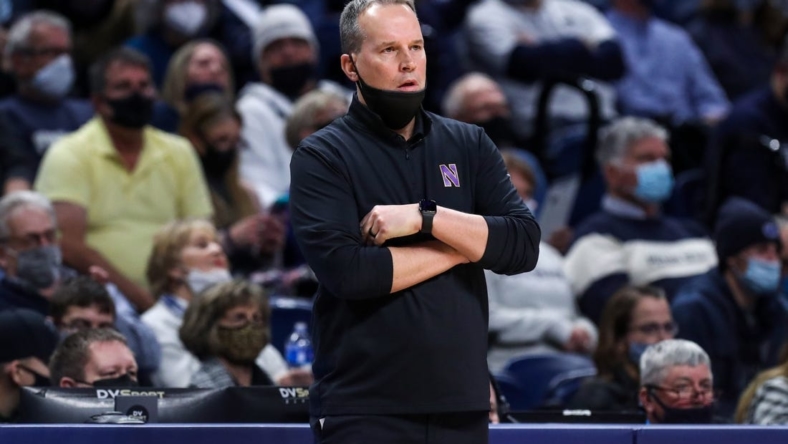 Feb 25, 2022; University Park, Pennsylvania, USA; Northwestern Wildcats head coach Chris Collins looks on from the bench during the first half against the Penn State Nittany Lions at Bryce Jordan Center. Penn State defeated Northwestern 67-60. Mandatory Credit: Matthew OHaren-USA TODAY Sports