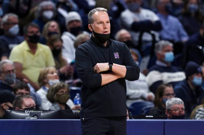 Feb 25, 2022; University Park, Pennsylvania, USA; Northwestern Wildcats head coach Chris Collins looks on from the bench during the first half against the Penn State Nittany Lions at Bryce Jordan Center. Penn State defeated Northwestern 67-60. Mandatory Credit: Matthew OHaren-USA TODAY Sports