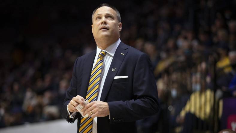 Feb 26, 2022; Berkeley, California, USA; California Golden Bears head coach Mark Fox looks up at the scoreboard during the first half against the Stanford Cardinal at Haas Pavilion. Mandatory Credit: D. Ross Cameron-USA TODAY Sports