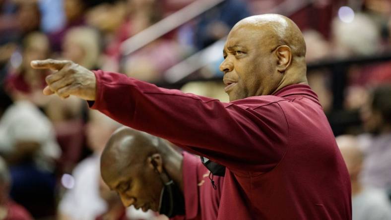 Florida State Seminoles head coach Leonard Hamilton talks to one of his assistant coaches. The Florida State Seminoles defeated the Notre Dame Fighting Irish 74-70 Wednesday, March 2, 2022.

Fsu V Nd Mbb Second Half393