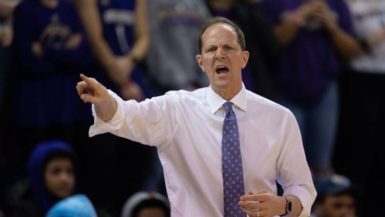 Feb 28, 2022; Seattle, Washington, USA; Washington head coach Mike Hopkins yells during a game against UCLA at Alaska Airlines Arena at Hec Edmundson Pavilion. Mandatory Credit: Stephen Brashear-USA TODAY Sports