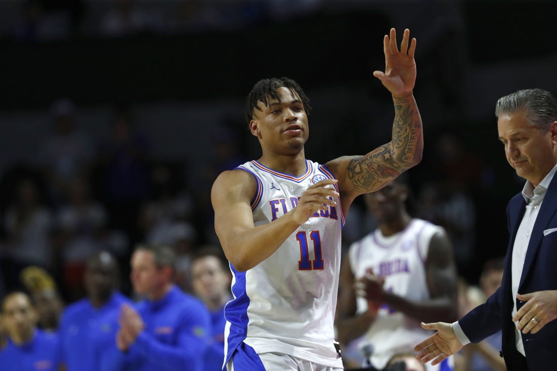 Mar 5, 2022; Gainesville, Florida, USA; Florida Gators forward Keyontae Johnson (11) is recognized before the game against the Kentucky Wildcats  during the first half at Billy Donovan Court at Exactech Arena. Mandatory Credit: Kim Klement-USA TODAY Sports