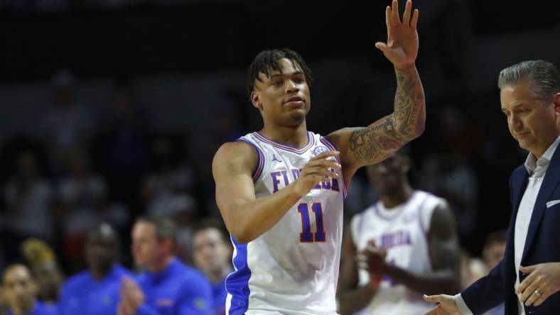 Mar 5, 2022; Gainesville, Florida, USA; Florida Gators forward Keyontae Johnson (11) is recognized before the game against the Kentucky Wildcats  during the first half at Billy Donovan Court at Exactech Arena. Mandatory Credit: Kim Klement-USA TODAY Sports