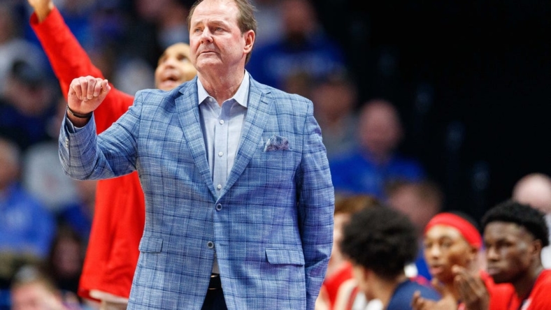 Mar 1, 2022; Lexington, Kentucky, USA; Mississippi Rebels head coach Kermit Davis celebrates during the first half against the Kentucky Wildcats at Rupp Arena at Central Bank Center. Mandatory Credit: Jordan Prather-USA TODAY Sports