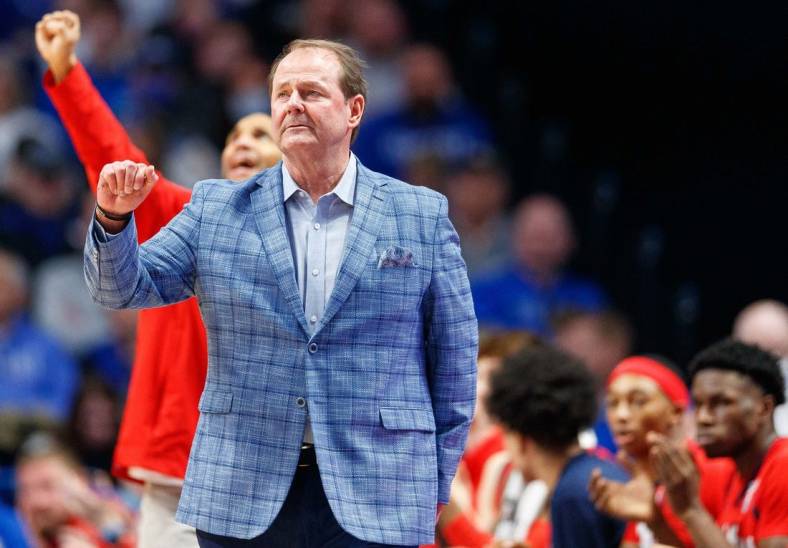 Mar 1, 2022; Lexington, Kentucky, USA; Mississippi Rebels head coach Kermit Davis celebrates during the first half against the Kentucky Wildcats at Rupp Arena at Central Bank Center. Mandatory Credit: Jordan Prather-USA TODAY Sports