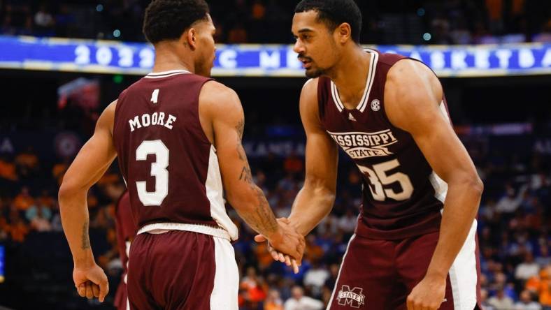 Mar 11, 2022; Tampa, FL, USA; Mississippi State Bulldogs guard Shakeel Moore (3) and forward Tolu Smith (35) react after a basket against the Tennessee Volunteers at Amelie Arena. Mandatory Credit: Nathan Ray Seebeck-USA TODAY Sports