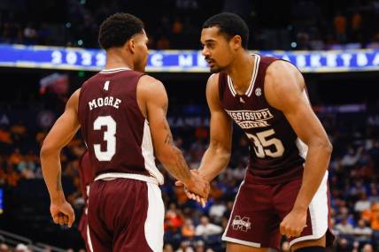 Mar 11, 2022; Tampa, FL, USA; Mississippi State Bulldogs guard Shakeel Moore (3) and forward Tolu Smith (35) react after a basket against the Tennessee Volunteers at Amelie Arena. Mandatory Credit: Nathan Ray Seebeck-USA TODAY Sports