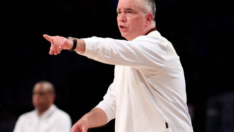 Mar 11, 2022; Brooklyn, NY, USA; Virginia Tech Hokies head coach Mike Young coaches against the North Carolina Tar Heels during the second half of an ACC Tournament semifinal game at Barclays Center. Mandatory Credit: Brad Penner-USA TODAY Sports