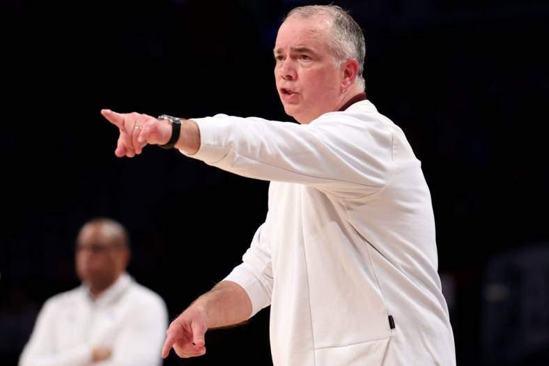 Mar 11, 2022; Brooklyn, NY, USA; Virginia Tech Hokies head coach Mike Young coaches against the North Carolina Tar Heels during the second half of an ACC Tournament semifinal game at Barclays Center. Mandatory Credit: Brad Penner-USA TODAY Sports