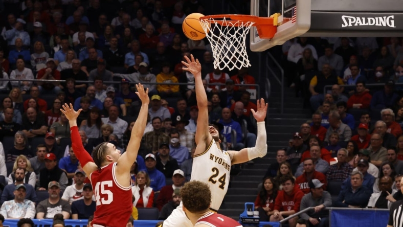 Mar 15, 2022; Dayton, OH, USA; Wyoming Cowboys guard Hunter Maldonado (24) shoots the ball in the in the first half against the Indiana Hoosiers during the First Four of the 2022 NCAA Tournament at UD Arena. Mandatory Credit: Rick Osentoski-USA TODAY Sports