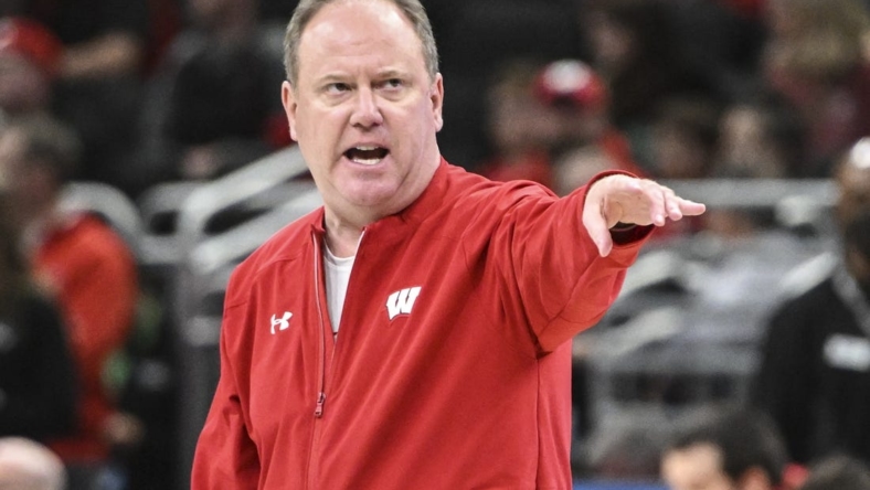 Mar 17, 2022; Milwaukee, WI, USA; Wisconsin Badgers head coach Greg Gard leads the team during practice before the first round of the 2022 NCAA Tournament at Fiserv Forum. Mandatory Credit: Benny Sieu-USA TODAY Sports
