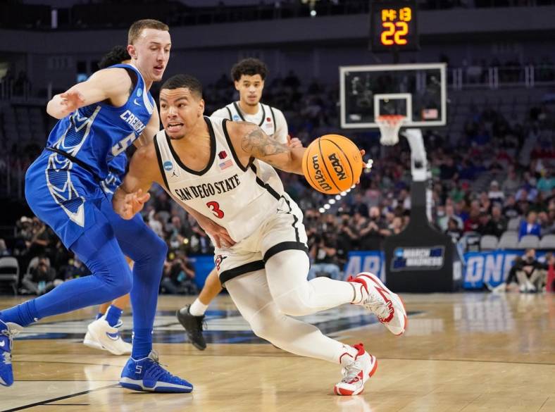 Mar 17, 2022; Fort Worth, TX, USA; San Diego State Aztecs guard Matt Bradley (3) drives to the basket past Creighton Bluejays guard Alex O'Connell (5) during the first half in the first round of the 2022 NCAA Tournament at Dickies Arena. Mandatory Credit: Chris Jones-USA TODAY Sports