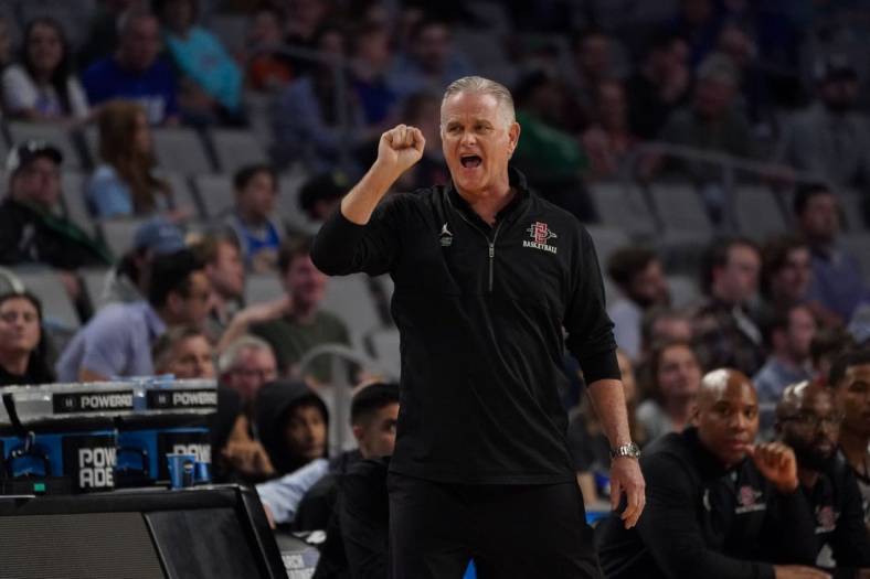 Mar 17, 2022; Fort Worth, TX, USA; San Diego State Aztecs head coach Brian Dutcher motions to his team during the first half against the Creighton Bluejays In the first round of the 2022 NCAA Tournament at Dickies Arena. Mandatory Credit: Chris Jones-USA TODAY Sports