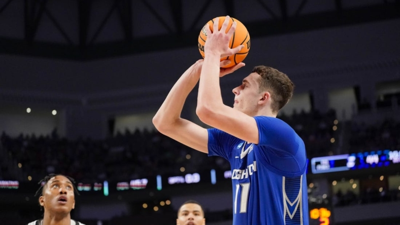 Mar 17, 2022; Fort Worth, TX, USA; Creighton Bluejays center Ryan Kalkbrenner (11) makes a jump shot against the San Diego State Aztecs during the second half in the first round of the 2022 NCAA Tournament at Dickies Arena. Mandatory Credit: Chris Jones-USA TODAY Sports