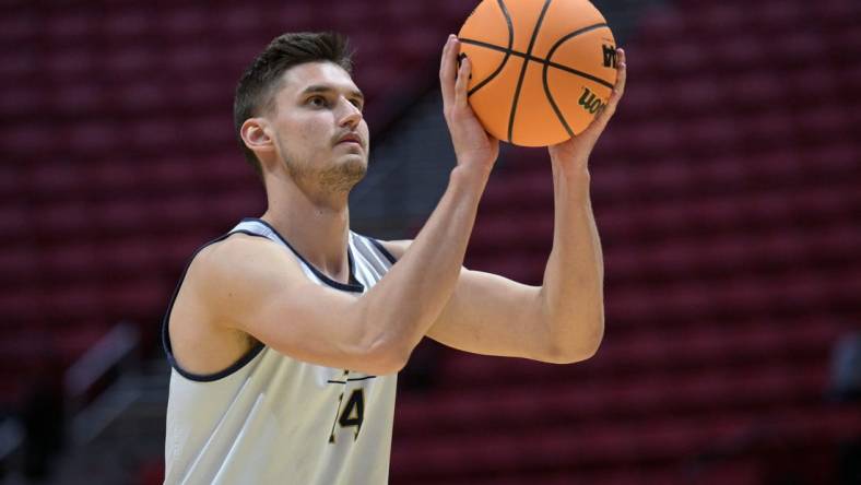 Mar 17, 2022; San Diego, CA, USA; Notre Dame Fighting Irish forward Nate Laszewski (14) shoots a free throw during practice before the first round of the 2022 NCAA Tournament at Viejas Arena. Mandatory Credit: Orlando Ramirez-USA TODAY Sports