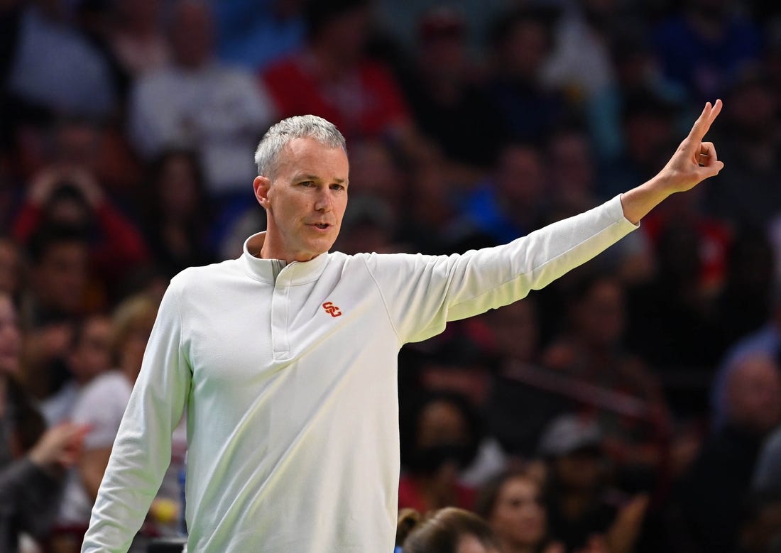 Mar 18, 2022; Greenville, SC, USA;  Southern California Trojans head coach Andy Enfield gestures against the Miami Hurricanes during the first round of the 2022 NCAA Tournament at Bon Secours Wellness Arena. Mandatory Credit: Bob Donnan-USA TODAY Sports