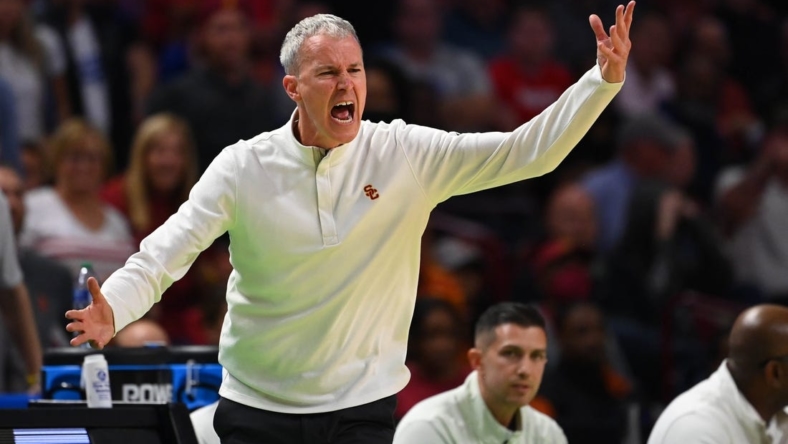 Mar 18, 2022; Greenville, SC, USA; Southern California Trojans head coach Andy Enfield reacts against the Miami Hurricanes during the first round of the 2022 NCAA Tournament at Bon Secours Wellness Arena. Mandatory Credit: Bob Donnan-USA TODAY Sports