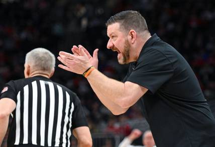 Mar 18, 2022; Milwaukee, WI, USA; Texas Longhorns head coach Chris Beard reacts during the first half against the Virginia Tech Hokies in the first round of the 2022 NCAA Tournament at Fiserv Forum. Mandatory Credit: Benny Sieu-USA TODAY Sports