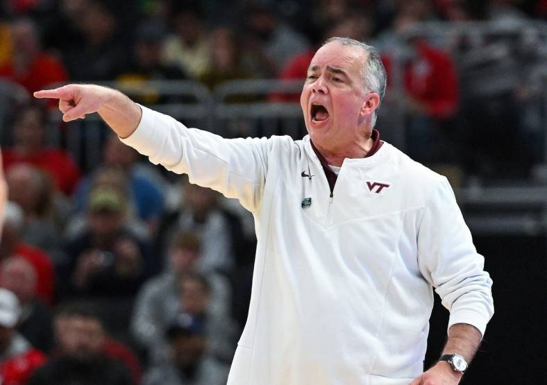 Mar 18, 2022; Milwaukee, WI, USA; Virginia Tech Hokies head coach Mike Young reacts during the first half against the Texas Longhorns in the first round of the 2022 NCAA Tournament at Fiserv Forum. Mandatory Credit: Benny Sieu-USA TODAY Sports