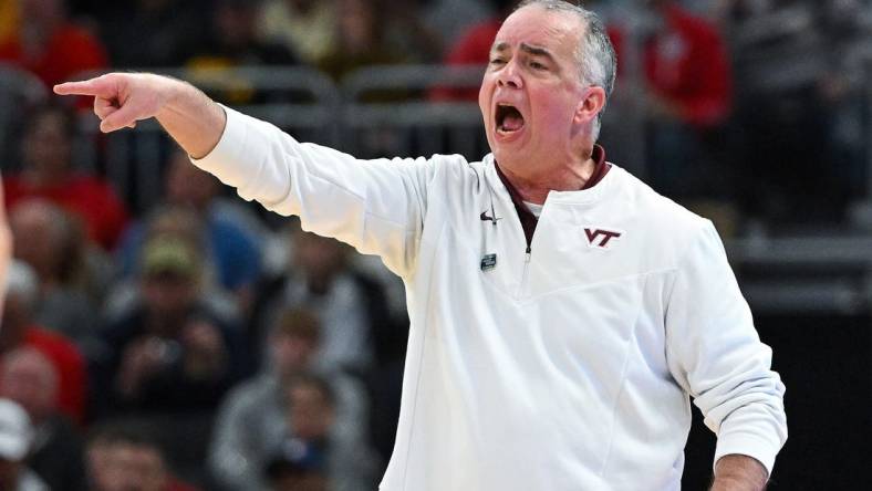 Mar 18, 2022; Milwaukee, WI, USA; Virginia Tech Hokies head coach Mike Young reacts during the first half against the Texas Longhorns in the first round of the 2022 NCAA Tournament at Fiserv Forum. Mandatory Credit: Benny Sieu-USA TODAY Sports