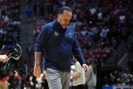 Mar 20, 2022; San Diego, CA, USA; Notre Dame Fighting Irish head coach Mike Brey leaves the court after the Texas Tech Red Raiders defeated the Notre Dame Fighting Irish during the second round of the 2022 NCAA Tournament at Viejas Arena. Mandatory Credit: Orlando Ramirez-USA TODAY Sports
