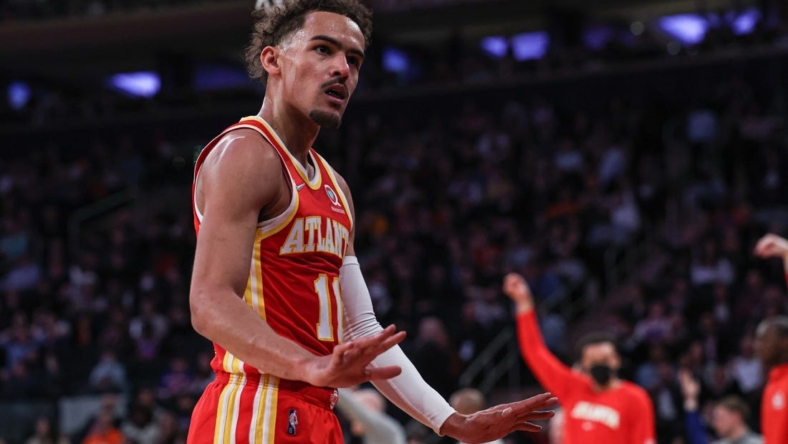 Mar 22, 2022; New York, New York, USA; Atlanta Hawks guard Trae Young (11) gestures towards the crowd during the first half against the New York Knicks at Madison Square Garden. Mandatory Credit: Vincent Carchietta-USA TODAY Sports