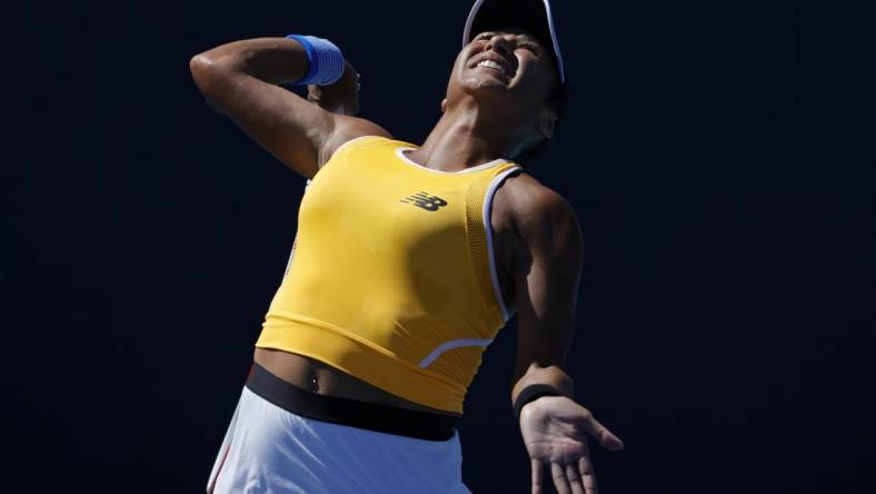 Mar 26, 2022; Miami Gardens, FL, USA; Heather Watson (GBR) serves against Belinda Bencic (SUI) (not pictured) in a women's singles third round match in the Miami Open at Hard Rock Stadium. Mandatory Credit: Geoff Burke-USA TODAY Sports