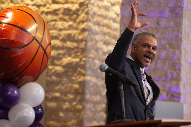 Jerome Tang, Kansas State   s new men   s basketball coach, forms a Powercat with his hands Thursday, March 24, 2022, during his introduction press conference.