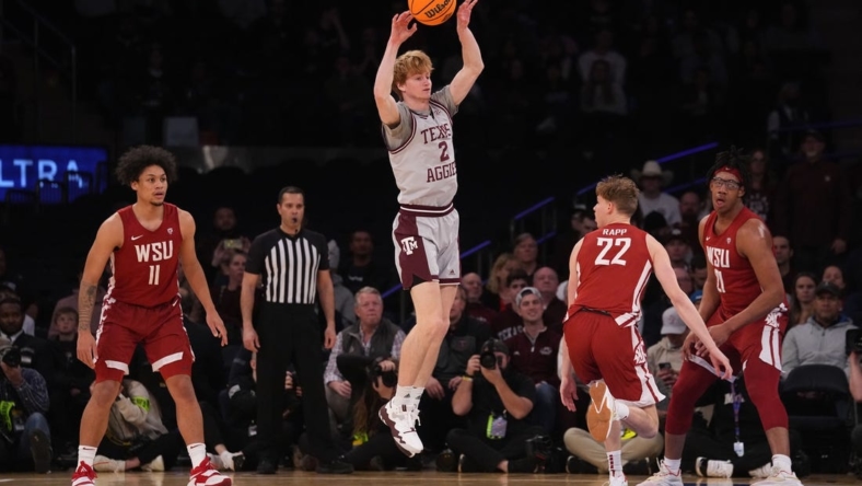 Mar 29, 2022; New York, New York, USA; Texas A&M Aggies guard Hayden Hefner (2) passes the ball against the Washington State Cougars during the second half of the NIT college basketball semifinals at Madison Square Garden. Mandatory Credit: Gregory Fisher-USA TODAY Sports