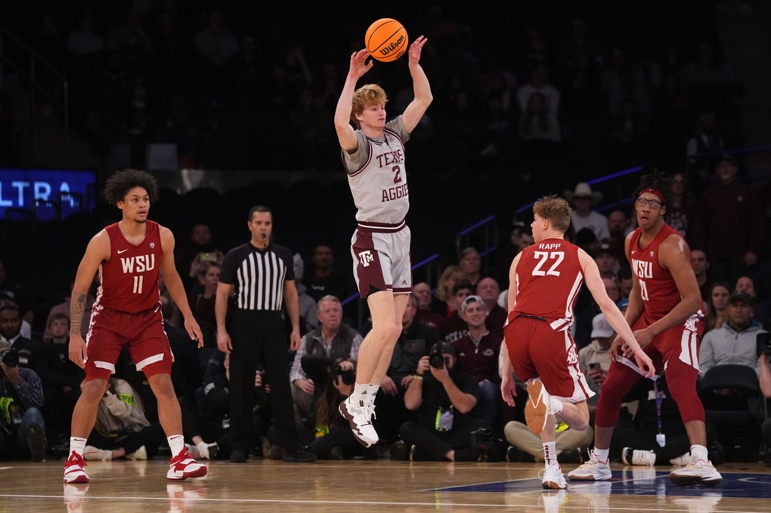 Mar 29, 2022; New York, New York, USA; Texas A&M Aggies guard Hayden Hefner (2) passes the ball against the Washington State Cougars during the second half of the NIT college basketball semifinals at Madison Square Garden. Mandatory Credit: Gregory Fisher-USA TODAY Sports