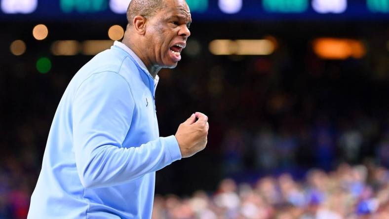 Apr 4, 2022; New Orleans, LA, USA; North Carolina Tar Heels head coach Hubert Davis reacts after a play against the Kansas Jayhawks during the second half during the 2022 NCAA men's basketball tournament Final Four championship game at Caesars Superdome. Mandatory Credit: Bob Donnan-USA TODAY Sports