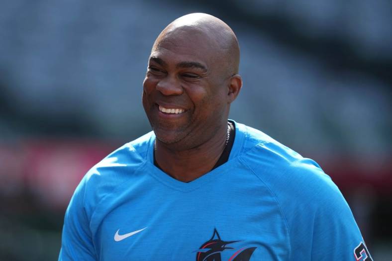 Apr 11, 2022; Anaheim, California, USA; Miami Marlins hitting coach Marcus Thames (33) reacts before the game against the Los Angeles Angels at Angel Stadium. Mandatory Credit: Kirby Lee-USA TODAY Sports