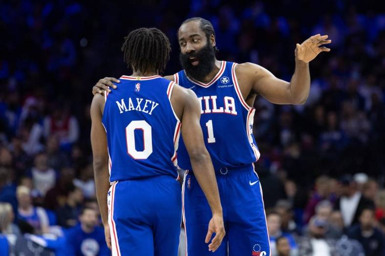 May 6, 2022; Philadelphia, Pennsylvania, USA; Philadelphia 76ers guard James Harden (1) talks with guard Tyrese Maxey (0) during the third quarter in game three of the second round for the 2022 NBA playoffs against the Miami Heat at Wells Fargo Center. Mandatory Credit: Bill Streicher-USA TODAY Sports