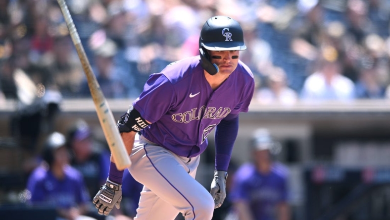 Jun 11, 2022; San Diego, California, USA; Colorado Rockies left fielder Sam Hilliard (22) tosses his bat after flying out during the fifth inning against the San Diego Padres at Petco Park. Mandatory Credit: Orlando Ramirez-USA TODAY Sports