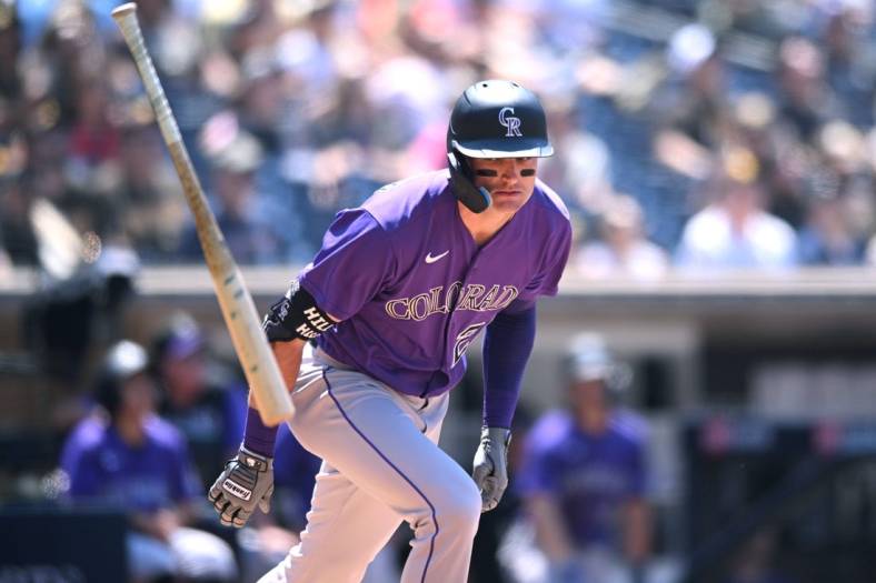 Jun 11, 2022; San Diego, California, USA; Colorado Rockies left fielder Sam Hilliard (22) tosses his bat after flying out during the fifth inning against the San Diego Padres at Petco Park. Mandatory Credit: Orlando Ramirez-USA TODAY Sports