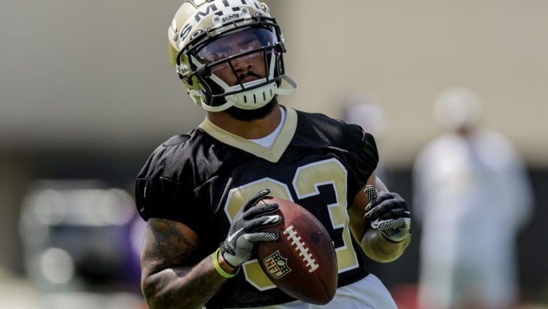 Jun 14, 2022; New Orleans, Louisiana, USA;  New Orleans Saints running back Abram Smith (33) runs drills during minicamp at the New Orleans Saints Training Facility. Mandatory Credit: Stephen Lew-USA TODAY Sports