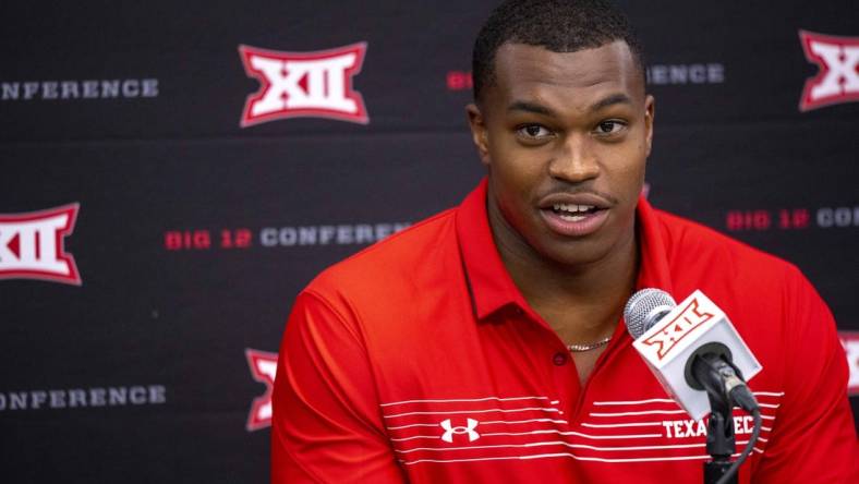 Jul 14, 2022; Arlington, TX, USA; Texas Tech Red Raiders outside linebacker Tyree Wilson is interviewed during the Big 12 Media Day at AT&T Stadium. Mandatory Credit: Jerome Miron-USA TODAY Sports